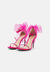 Pink high-heeled sandals with sheer ribbon straps on a light pink background