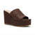 A dark brown woven wedge slide sandal with an open toe, shown from a three-quarters angle on a white background.