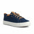 A navy blue canvas low-top sneaker with tan laces and a thick white rubber sole, shown from a three-quarters angle on a white background.