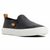 A black slip-on platform sneaker with a thick white sole and a small tan pull tab, shown from a side profile on a white background.