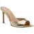 Gold high-heeled shoe on a white background
