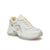 A white Skechers sneaker with light pink and gray accents, featuring chunky platform soles and textured laces, shown against a plain white background.