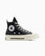 Black high-top sneaker with white laces and sole on a white background