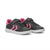 A pair of black children's sneakers with bright pink accents, including the chevron logo on the side, the lining of the collar, and the hook-and-loop strap interiors, set against a plain white background.