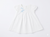 Ativo Baby Girl's White Cotton-Blend Dress With Decorative Bows | Ativo In Lebanon