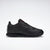 Black Reebok sneaker on a white background