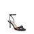 Brown high-heeled sandal with floral embellishment on a white background