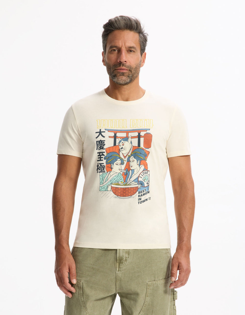 Man wearing a white t-shirt with a graphic design on a white background