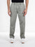 Person wearing gray pants on a white background
