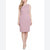 A woman modeling a sleeveless, knee-length pink knit dress with a textured pattern and a floral lace neckline, set against a plain white background.