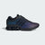 Black and blue sneaker on a light gray background