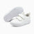 A pair of white toddler sneakers with hook-and-loop straps, shown on a clean white background. One shoe is positioned upright to show the side profile, while the other is turned to display the sole with embossed cartoon details.