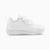 A white Puma kids' sneaker with a hook-and-loop strap closure, shown in a side profile on a light gray background.