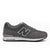 A single New Balance sneaker in dark gray suede and mesh, featuring the signature white outlined 'N' logo on the side, gray laces, and a white and gray midsole, shown against a plain white background.