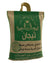 A green jute bag of Taj Tijan branded Indian Sella Basmati Rice with Arabic text and the weight '4kg' visible.