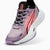 A Puma running shoe in a lavender-to-pink gradient with black and white details, shown from a three-quarters angle on a light gray background.