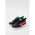A pair of Puma kids' sneakers in black, featuring a red side stripe, blue laces, a turquoise tongue label, and white soles, set against a light gray background.