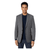 Man wearing a gray blazer over a navy sweater and pants on a white background