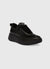 Black sneaker with platform sole on a white background