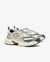 Pair of white and black sneakers on a white background