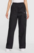 Person wearing black cargo pants with a Nike logo on a white background