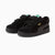 Black sneakers with a Nike logo on a white background