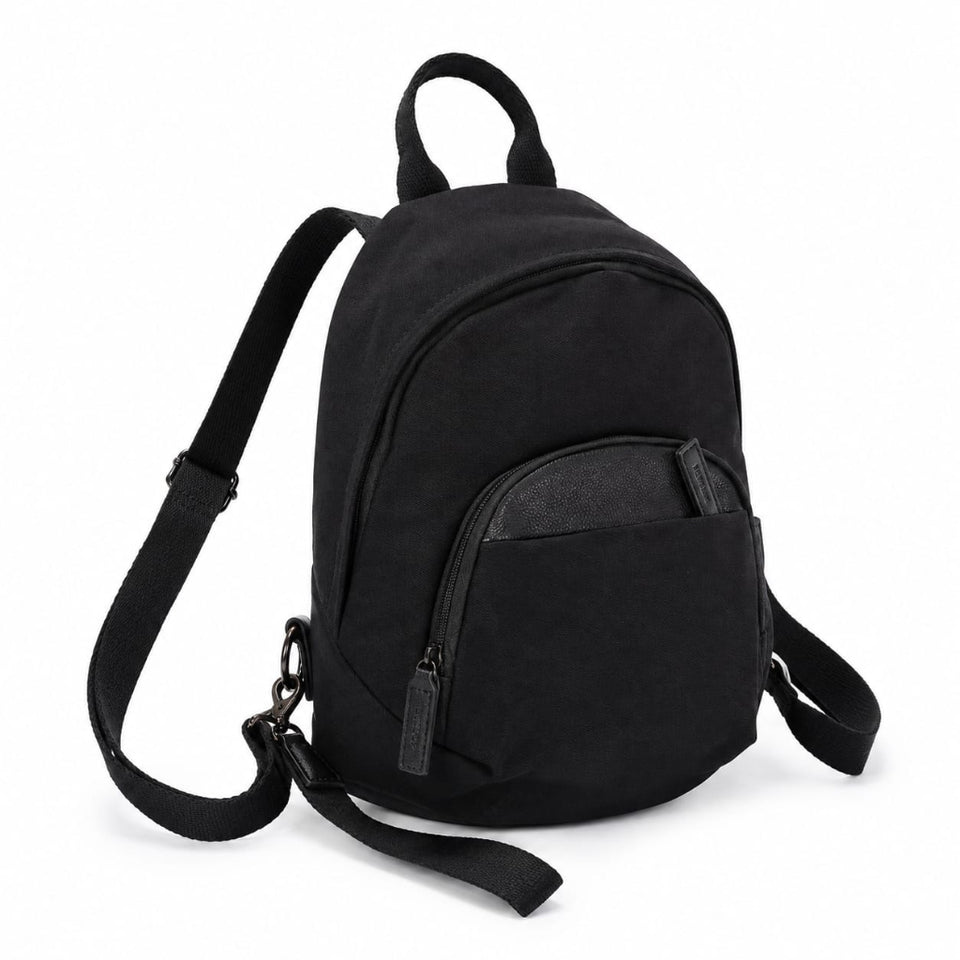 A black canvas backpack with a front zippered pocket and an adjustable shoulder strap, shown on a plain white background.