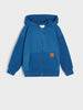 Blue hoodie with a brand logo on a light gray background