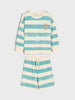 Children's pajama set with blue and white stripes on a light gray background