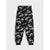 Black jogger pants with an all-over white skeleton dinosaur print, featuring an elastic waistband and ribbed ankle cuffs, shown flat on a light gray background.