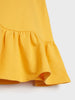 Yellow dress with ruffled hem on a white background