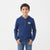A young boy wearing a navy blue hooded knit sweater with a three-button henley collar and a small tennis ball graphic on the chest, paired with blue jeans, standing against a plain white background.