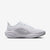 White running shoe on a light gray background