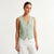 A woman modeling a sleeveless light green and white vertically striped vest with a V-neck and three front buttons, paired with white pants, against a plain white studio background.
