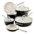 A 7-piece nonstick cookware set with black exteriors, cream interiors, and silver stainless steel handles and lids, shown on a white background.
