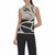 A woman modeling a sleeveless knit top with an abstract black and beige pattern, paired with black pants, against a plain white background.