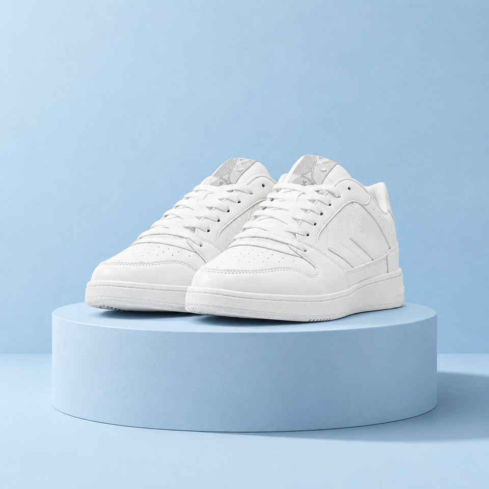 White sneakers with black and gray accents on a white background