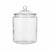 A clear glass jar with a matching glass lid featuring a small round knob, shown against a plain white background.