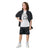 A child model wearing a casual outfit consisting of a white graphic t-shirt, a black button-up shirt, black patterned shorts, white socks, and white sneakers, set against a plain white background.