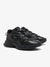 Three black sneakers arranged in a row on a white background