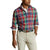 Person wearing a colorful plaid shirt and beige pants on a white background