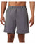 Gray shorts worn by a person on a white background