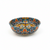 Decorative ceramic bowl with floral patterns on a white background