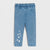 Light blue denim leggings for toddlers or kids, featuring an elastic waistband, side pockets, and a cluster of embroidered white daisies on the lower left leg, shown against a light gray background.
