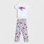 A two-piece kids' pajama set featuring a white short-sleeve t-shirt with a red and blue 'GOAL.' graphic, paired with white leggings covered in a soccer ball print.