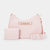 A light pink hobo-shaped shoulder bag with a matching small wallet and a wide matching belt, all featuring a subtle embossed pattern and a gold-tone 'bebe' logo plaque, set against a plain light gray background.
