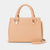 Beige handbag with gold chain detail on a light gray background