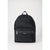 A black nylon backpack with a front zippered pocket featuring a silver-tone 'MK' logo, shown against a light gray studio background.