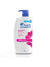 A bottle of Head & Shoulders Smooth & Silky Shampoo with a pump dispenser, predominantly white with blue and pink accents, and product information.