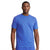 A man wearing a blue short-sleeve crewneck t-shirt with a repeating small polo player pattern, photographed against a plain white background.